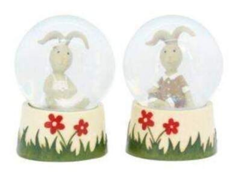 Choice of Girl or Boy Bunny Rabbit Glitter Dome by Gisela Graham. Gorgeous Easter bunny snow globe glitter dome. A lovely Easter present for children or to have as an Easter decoration in the home. The girl bunny is dressed in a white dress and the boy bunny is dressed in a brown shirt and trousers. The base of the Easter glitter dome is painted with red flowers and green grass. When you shake the globe and the glitter moves around inside. If preference please specify Girl or Boy when ordering. Size: 65mm